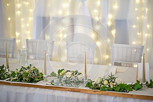 Wedding table with flowers and decorations, wedding centerpiece or event reception