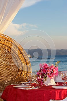 Wedding table set up on tropical beach photo