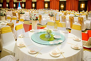 wedding table sets in wedding hall. wedding decorate preparation.