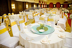 Wedding table sets in wedding hall. wedding decorate preparation.