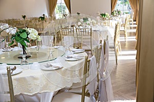 Wedding table sets in wedding hall. wedding decorate preparation.