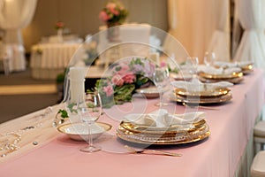 Wedding table setting. Asian banquet table decoration