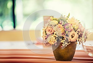 Wedding table setting. Beautiful table set with flowers and glass cups for some festive event, party or wedding reception