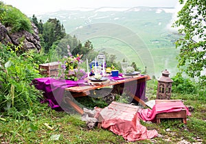 Wedding table setting decorated in rustic style. Wedding inspiration on mountain.