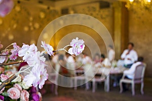 Wedding table setting with flowers and candle, decoration and design background