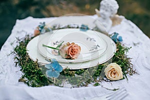 Wedding table setting in rustic style.