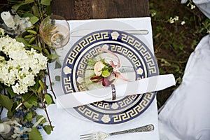 Wedding table setting in rustic style.