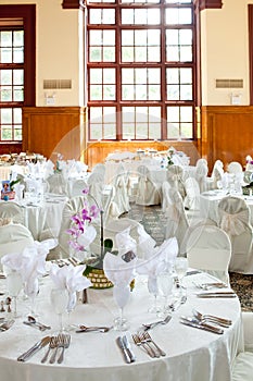 Wedding tables with and orchid centerpiece
