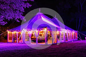 Wedding tent at night purple color