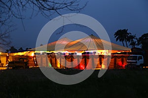 wedding tent night surrounded