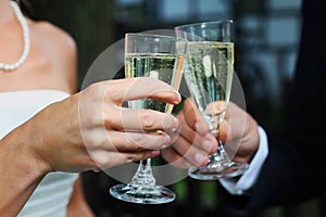 Wedding toasting glasses photo