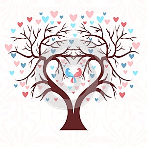 The wedding tree in the shape of a heart with two birds