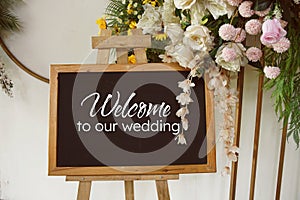 Wedding welcome board wooden frame with flowers decoration