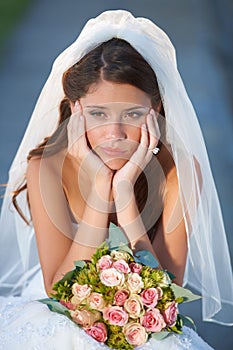 Wedding, woman and bride with bouquet for thinking, unhappy and disappointed with ceremony, commitment or event