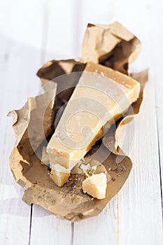 Wedge of luxury Parmigiano-Reggiano cheese photo