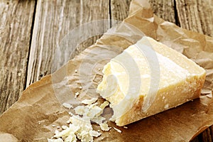 Wedge of parmigiano reggiano cheese photo