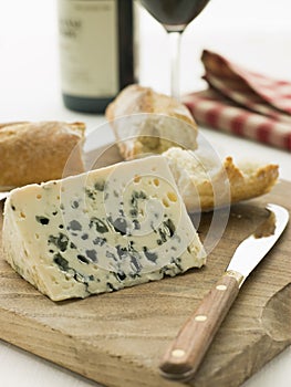 Wedge of Roquefort Cheese with Rustic Baguette