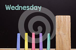 Wednesday on Blackboard with chalk and eraser