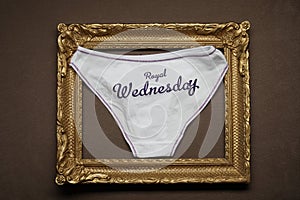 Wednesday white panties in a wooden photo frame
