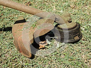 A weed-wacker at belmont house, bequia