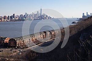 Weehawken New Jersey Riverfront with a Row of Townhouses and a Lower Manhattan New York City Skyline View photo