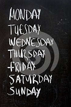 Weekdays on blackboard photo