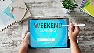 Weekend loading status bar message on device screen.