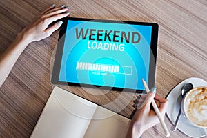 Weekend loading status bar message on device screen.