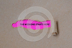 The Weekend Starts Here word written under torn paper