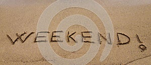 Weekend ! written in sand, on a beautiful beach