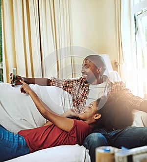 Weekends are best when theyre together. a young couple relaxing together at home.