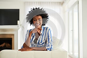 Weekends couldnt make me any happier. Portrait of a young woman relaxing at home.