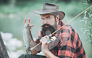 Weekends made for fishing. Fish so big. Portrait of cheerful bearded man fishing. Happy fly fishing. Having a good time