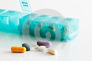 A weekly container of tablets, vitamins etc
