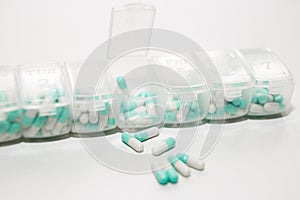 A weekly dosage of medication in pill dispenser