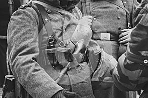 Wehrmacht soldier in full uniform with a sapper shovel