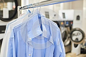 Weigh clean shirts on hangers