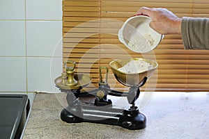 Weighing flour in scales