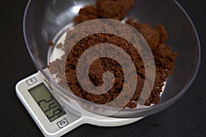 Weighing muscovado sugar