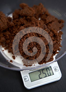 Weighing muscovado sugar