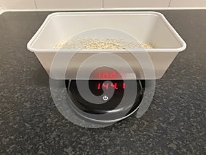 Weighing rice to meal prep