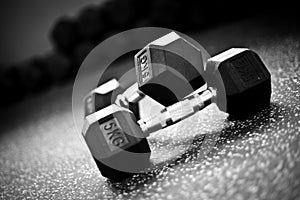 Weight lifting-Dumbells in a crossfit gym