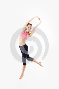 Weight loss fitness woman jumping of joy. Caucasian female model