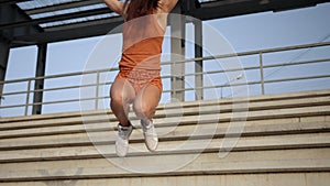 Weight loss fitness woman jumping joy. Young sporty fit caucasian female model