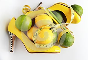 Weight Loss .Measuring tape wrapped around lemon