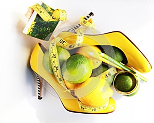 Weight Loss .Measuring tape wrapped around lemon