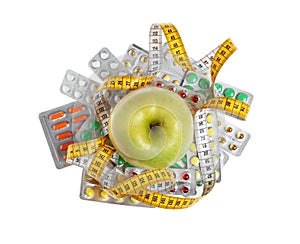 Weight loss pills in blister packs, apple and measuring tape on white background