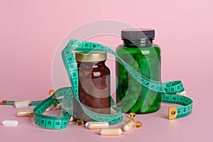 Weight Loss Pills and Measuring Tape, Diet Supplements Capsules, Obesity Lose Tablets, Color Drugs Pile