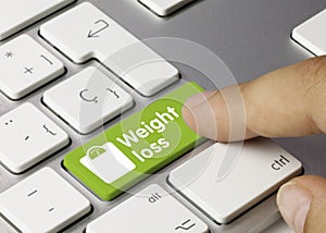 Weight loss - Inscription on Green Keyboard Key