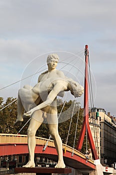 The weight of One Self sculpture in the front of Bridge of the Palace of Justice in Lyon, Fr